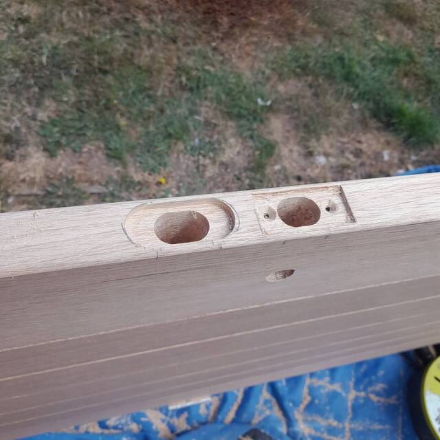 During: hinge and latch recesses cut in a new oak door