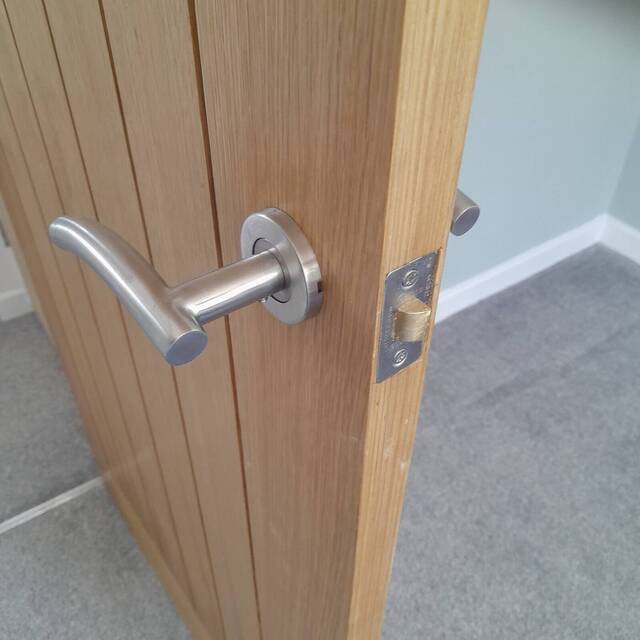 Lever handle fitted to a new oak door
